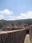 SX27521 Jenni looking at view from Chateau Royal de Collioure.jpg